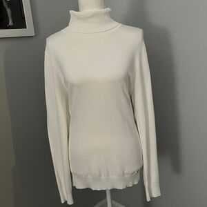 Women’s Calvin Klein Cream Turtleneck Sweater, size L.
